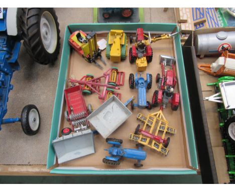 A collection of loose playworn diecast farm vehicles including Corgi No. 69 Massey Ferguson 165 tractor with shovel and No. 7