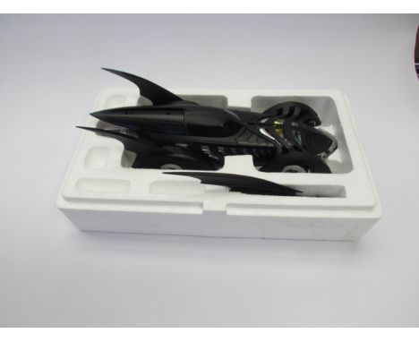 A boxed Hot Wheels 1:18 scale Batman Forever Batmobile 