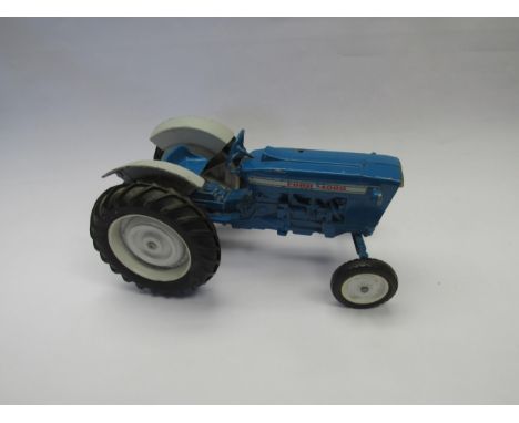 A playworn diecast Ford 4000 tractor 