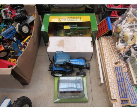 A boxed ERTL 1:64 scale John Deere 7720 Combine, Hachette Power Major tractor and Vanguards Ford Popular Van in Fordson liver
