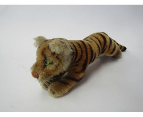 A vintage Steiff mohair tiger, approx. 30cm long, no button 