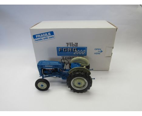 A Danbury Mint 1:16 scale diecast 1962 Ford 2000 Tractor, boxed with certificate of authenticity 
