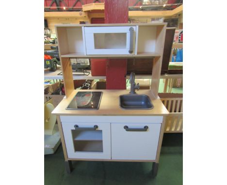 An Ikea toy kitchen unit with hob and basin 