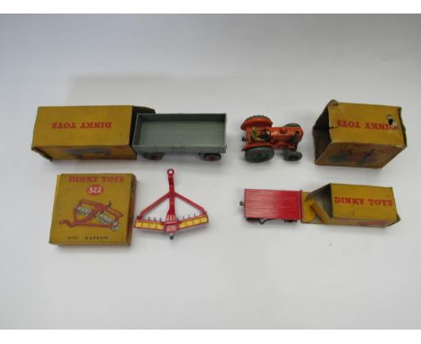 Four boxed Dinky Toys diecast farm vehicles and implements to include 301/27n Field-Marshall Tractor (paintwork chipped, box 