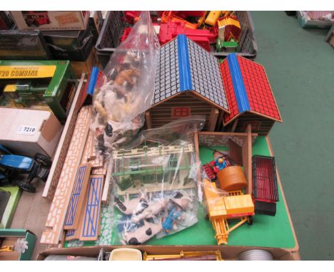 A collection of diecast and plastic agricultural vehicles, implements including Britains cow milking parlour, bailer, Ford 56
