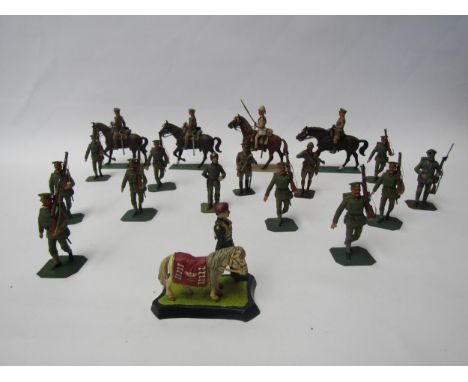 A collection of lead figures of WW1 era British Army servicemen including mounted officers and riflemen together with a US Ar