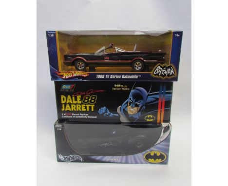 Three boxed 1:18 scale diecast Batman vehicles to include Hot Wheels Batmobile and 1966 TV Series Batmobile and Revell 1998 B