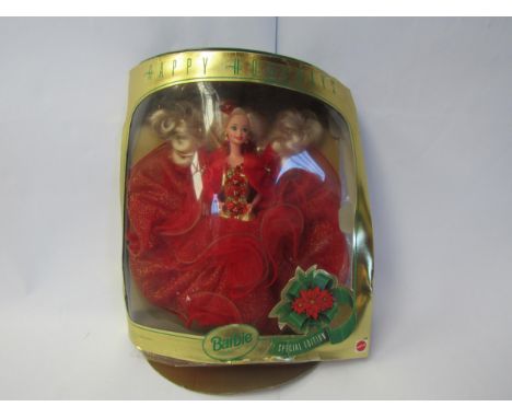 A boxed Mattel Barbie Happy Holidays special edition doll, box a/f 