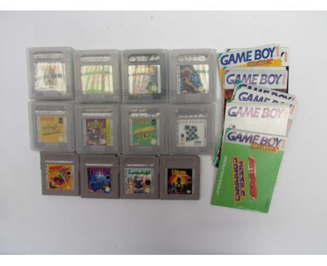 Twelve Nintendo Game Boy games and manuals to include Ultima Runes of Virtue, Lemmings, Arcade Classic 1 (no manual), Arcade 