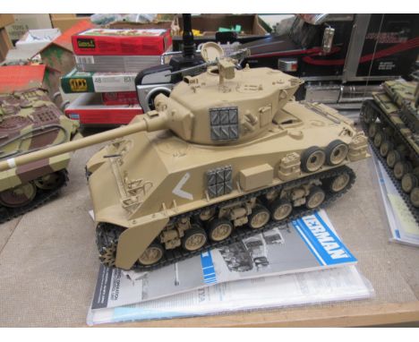A Tamiya 1:16 scale radio control M51 Super Sherman tank with Planet T5 remote control system 
