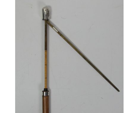 A good 19th Century Walking Cane, with concealed rule and spirit level for measuring the height of horses and with silver mou