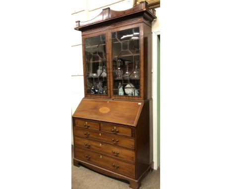 A fine quality Georgian period mahogany Bureau Bookcase, the unusually shaped cornice with shell inlay decoration over astrag