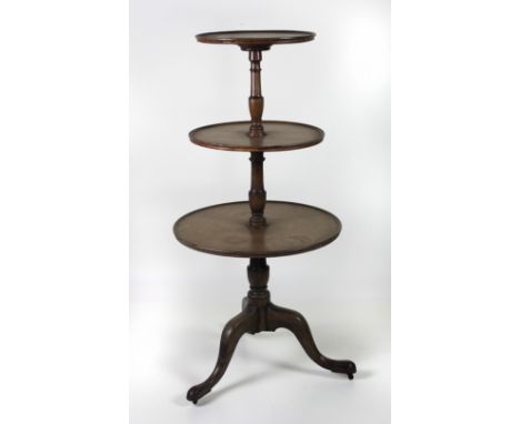 A late Georgian period circular three tier Dumbwaiter, with graduating shelves and turned stem, raised on tripod base, 48" x 