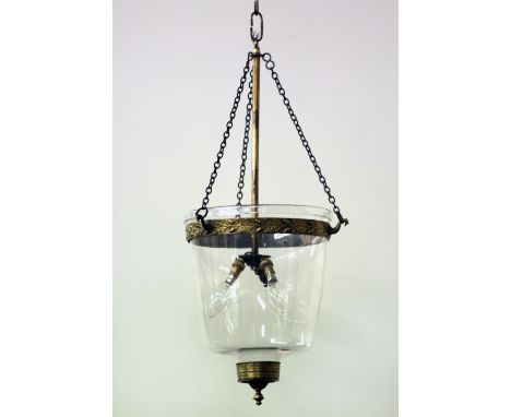 A Regency style domed glass Ceiling Light, with decorative brass rim designed with shamrocks and oak leaf, terminating with a