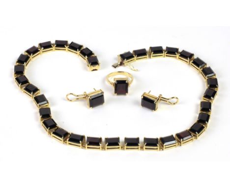 A fine and desirable set of Jewellery consisting of a Necklace, Ear-Rings and Ring, the necklace set with 33 rectangular garn