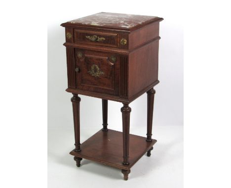 A 19th Century French style Lamp Table, with marble inset top and ormolu mounts, with frieze drawer on reeded tapering legs o