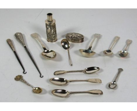 Silverware: A varied collection of silver Spoons, some Georgian & Victorian, two embossed silver handled boot pulls, an attra