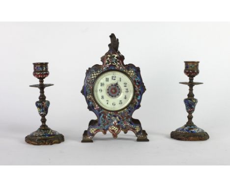 An attractive small 19th Century cloisonné enamel Clock Set, with shaped clock, and matching pair of candlesticks. (3) 