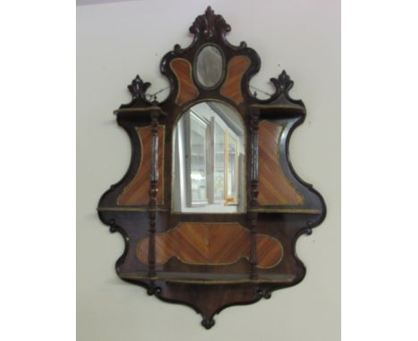 An attractive French rococo style kingswood and brass mounted Wall Bracket, with mirror back. (1)