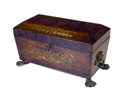 An important Regency brass inlaid rosewood Tea Caddy, with lift top opening to reveal similarly decorated interior, on brass 