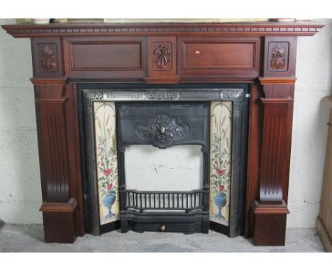 An attractive mahogany Fire Surround, with cast iron and tiled inset. (1)