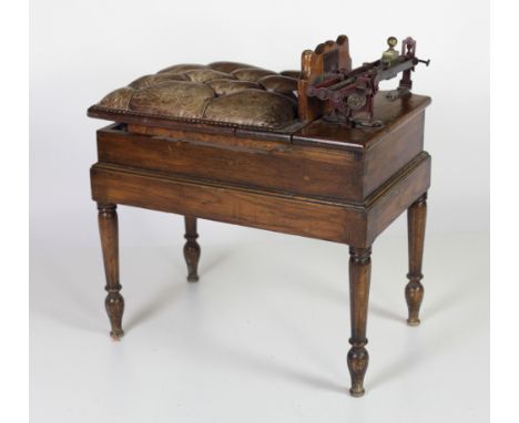 An early 20th Century oak Jockey's Scales, inscribed 'Longchamps,' Lyon [France] with brass label, with deep buttoned leather