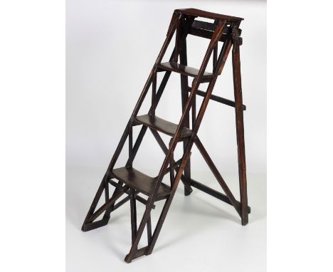 An attractive Victorian wooden Step Ladder, "The Natherley Pattent Lattistep," used as a bookshelf, well worn, nicely coloure