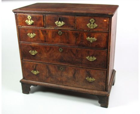 A late 18th Century / early 19th Century mahogany and walnut Chest, of three short and three long drawers with crossbanded to