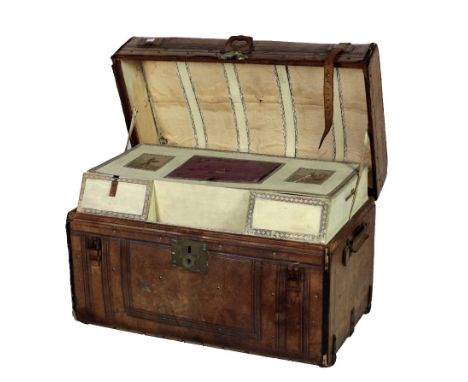 A fine rare large tooled and embossed American leather humpback Travel Trunk, fitted with compartmented tray, 'Warranted Sole