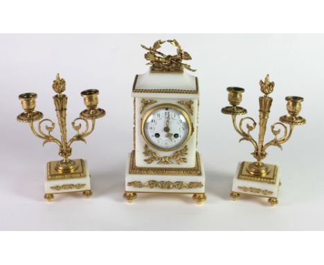 A 19th Century three piece marble and ormolu Clock Garniture, the clock with a circular floral painted enamel dial and an orm