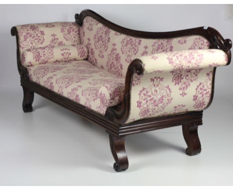 An attractive late Regency period mahogany Settee, with down curved moulded back covered in attractive light floral pattern, 