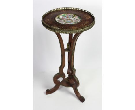 An attractive French grained rosewood and brass mounted Jardiniere Stand, the circular top with a pierced brass gallery, and 