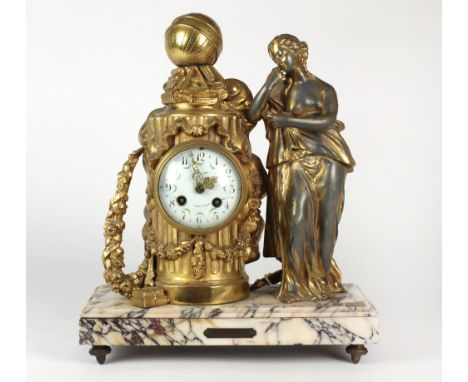 A 19th Century French ormolu Mantle Clock, depicting a young girl with book in hand resting against a stylized pillar, and de