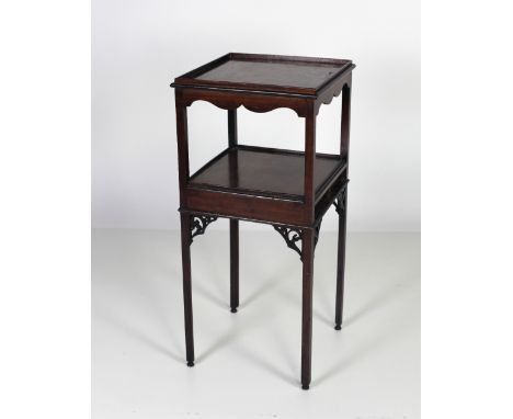 A 19th Century mahogany two tier Bedside Pedestal, the galleried top above a shaped frieze and a lower shelf with drawer, rai