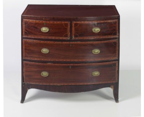 An attractive George III inlaid and crossbanded bow fronted mahogany Chest, of two short and two long drawers,on splayed brac