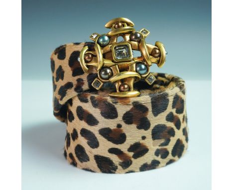 A striking women's belt featuring a bold faux leopard print design on a wide strap, measuring approximately 45 inches in leng
