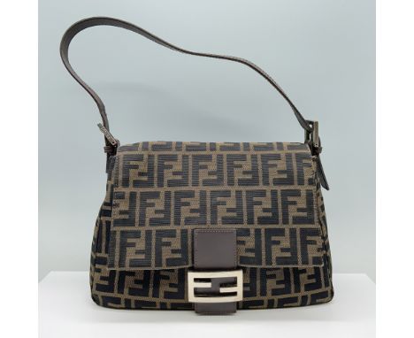 Features iconic Zucca monogram canvas, complemented by brown leather trim and silver-tone hardware. It includes a front flap 