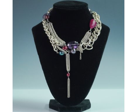 A striking handcrafted multi-chain choker by designer Connie Bates, featuring an eclectic mix of thick and fine silver-toned 
