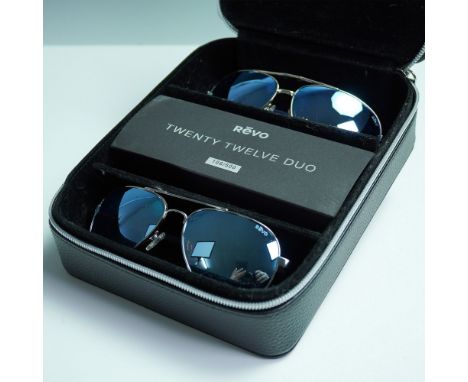 A rare and highly collectible Revo Twenty Twelve Duo Limited Edition sunglasses set, featuring two distinct styles housed in 