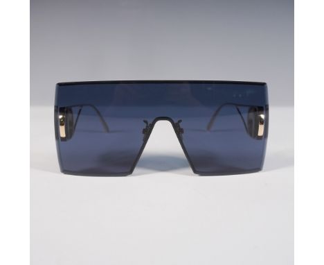 Contemporary Dior 30Montaigne shield sunglasses featuring a striking blue single-lens visor design paired with slim gold-tone