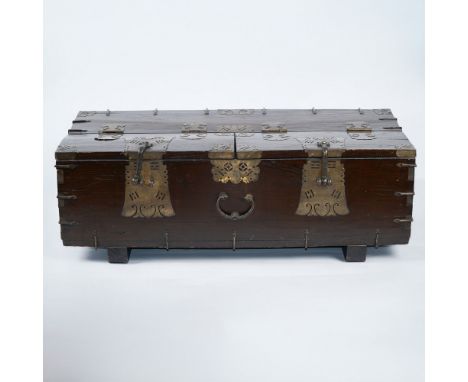 This antique Korean coin chest from the 19th century showcases traditional craftsmanship with its sturdy wooden construction 