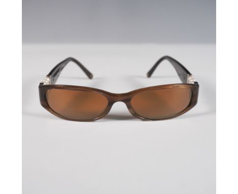 From the coveted Chanel Collection Perle, these vintage sunglasses exude timeless sophistication with their oval brown lenses
