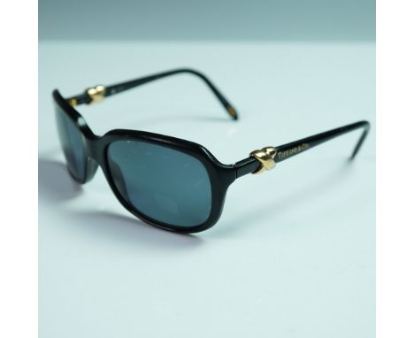 Chic Tiffany &amp; Co. sunglasses from the Knot Collection, showcasing a black acetate frame with dark tinted rectangular len
