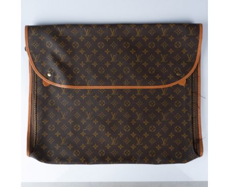 Presenting a timeless Louis Vuitton Monogram Canvas Garment Cover, an elegant travel essential for the discerning collector. 