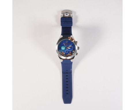 MULCO BE Confident chronograph wristwatch featuring a vibrant electric blue dial with pixelated block motif and subdials, enc
