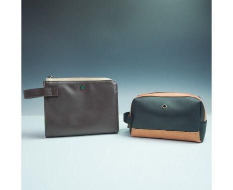 Pair of Bvlgari Parfums toiletry bags made exclusively for Emirates First Class. Includes one two-tone black and tan pouch an