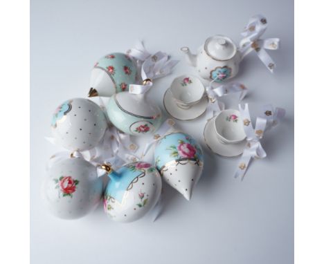 Set of three Royal Albert porcelain ornament sets, totaling nine pieces. This collection includes miniature teapot and teacup