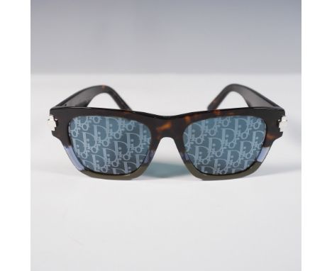 A stylish pair of Dior BlackSuit XL S2U sunglasses featuring a tortoiseshell frame with an angular design. The lenses showcas
