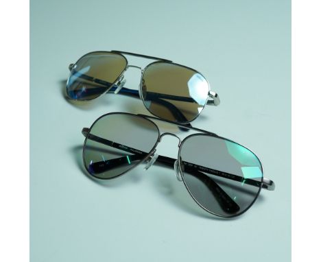 This exclusive Revo Twenty Twelve Duo sunglasses set includes two distinct aviator-style sunglasses, both featuring high-perf