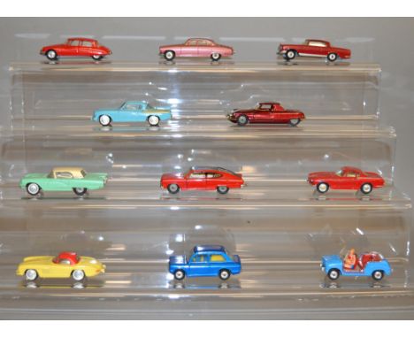 Twelve unboxed Corgi Toys diecast model cars, including 240 FIat 600 Jolly, missing hood. a Citroen DS19 in red with spun hub